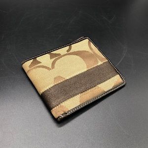 Coach slim double billed wallet. 6 card slots.